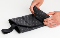 Vorschau: suprima Inkontinenz Sitzauflage "to go" zum Aufrollen mit Anti-Rutsch Noppen