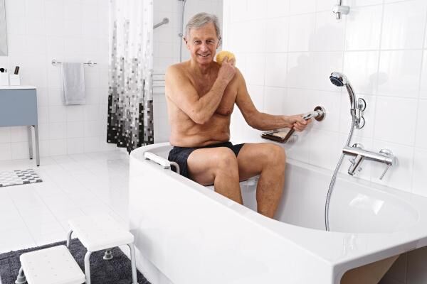 RIDDER Bad Winkel-Haltegriff Sam M mit ergonomisch geformter Grifffläche inkl. Ablagekorb